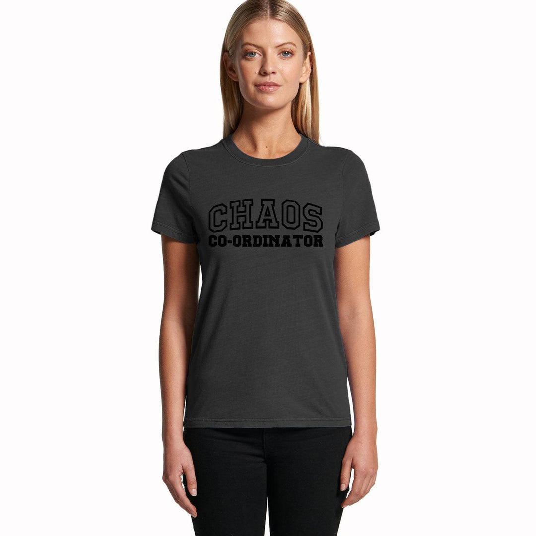 Black Chaos Co-Ordinator Tee with bold black lettering, modeled by a woman in a casual pose, suitable for equestrian-themed outfits.