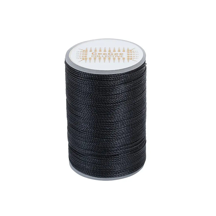 Black horse plaiting thread spool for creating strong, secure plaits. Ideal for equestrian grooming and available in premium waxed finish.