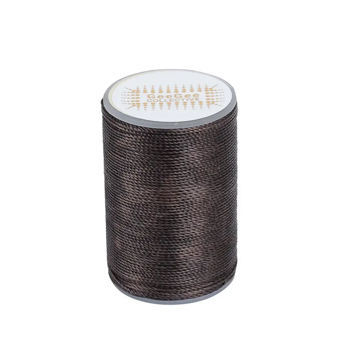 Dark brown horse plaiting thread spool offering strength and precision for plaiting. Waxed finish ensures secure and damage-free styling.