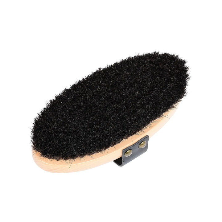 Close-up of Softie horse brush showing soft black bristles for a smooth and polished finish.