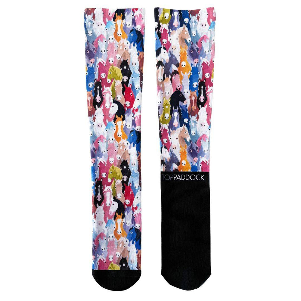 Herd of Hues Compression Riding Socks with vibrant horse-themed design, offering support and style for horse riders.