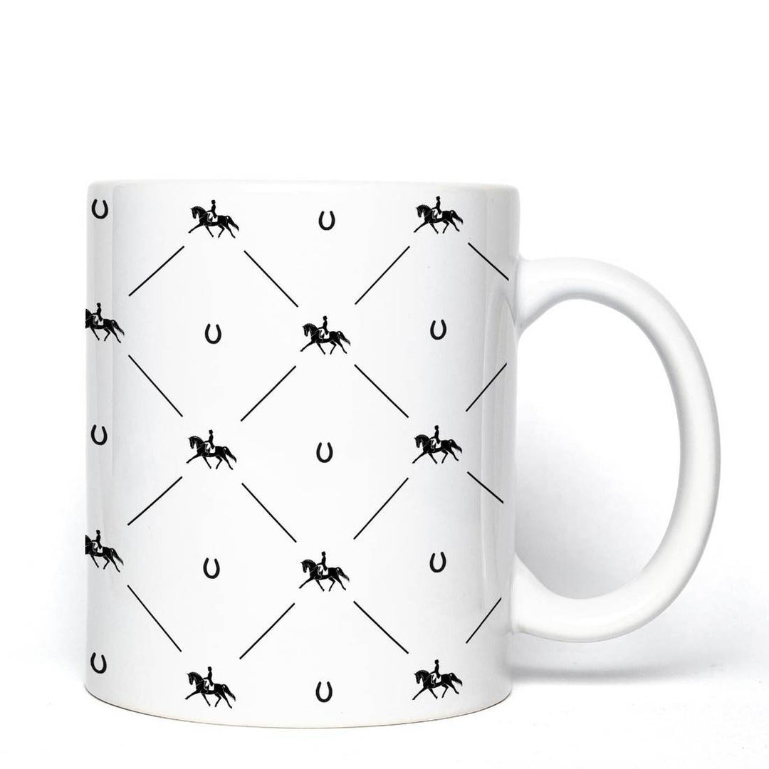 Dressage Diva Mug featuring a black equestrian and horseshoe pattern on white ceramic. Perfect for equestrian enthusiasts, 11oz capacity.