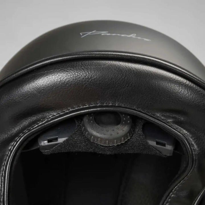 Interior view of the Back On Track EQ3 Pardus Smooth Horse Riding Helmet with MIPS, showing the adjustable dial and padded lining for comfort.