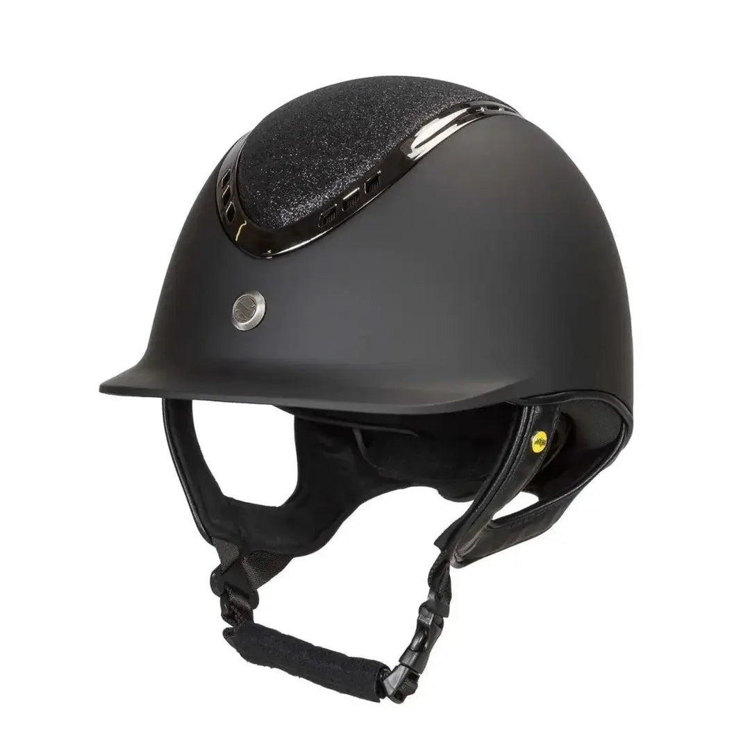 Back On Track EQ3 Pardus Smooth with Sparkle riding helmet featuring a matte black finish, sand sparkle accent, and MIPS technology for safety.