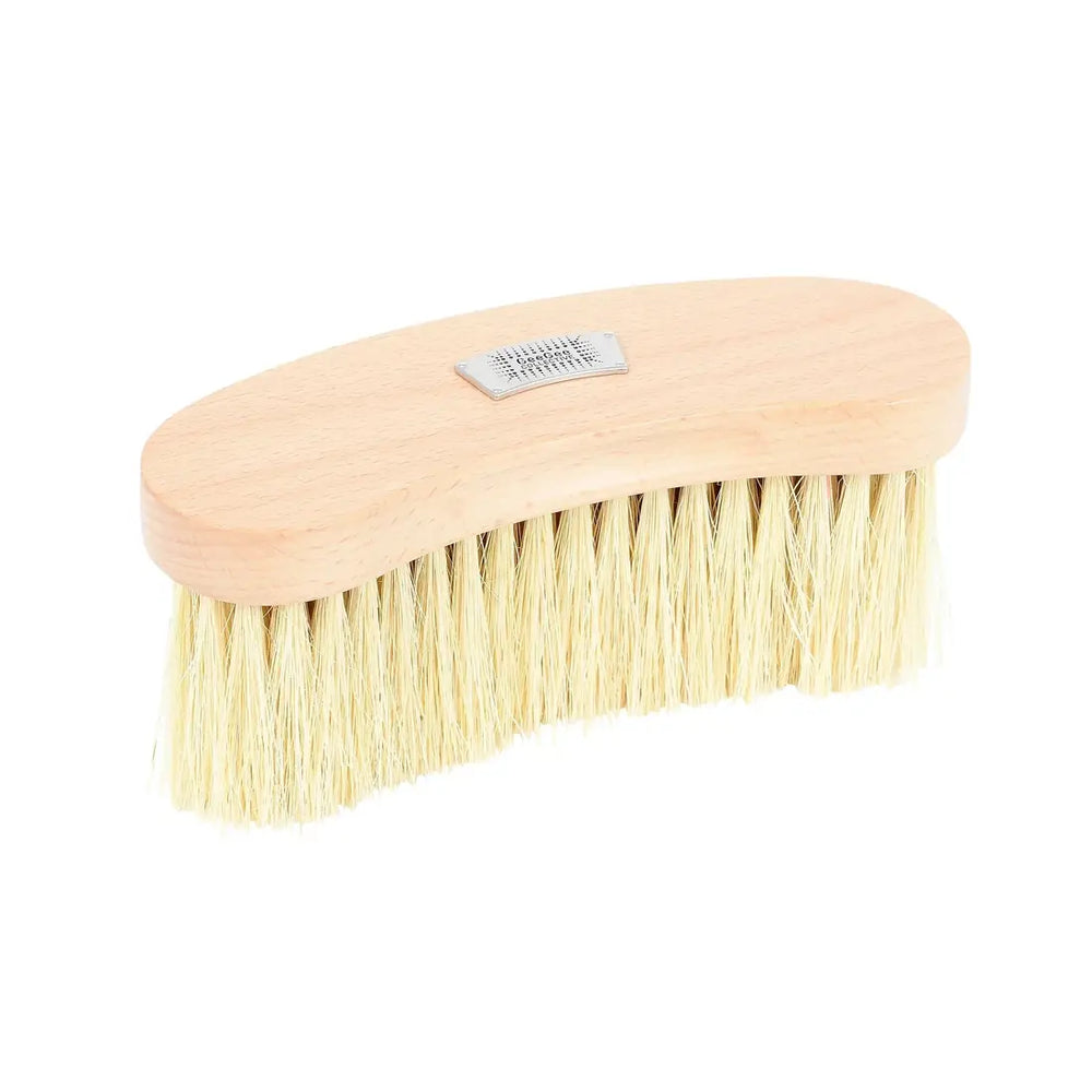 Curved wooden brush with natural bristles from the Ultimate Brush Kit, ideal for horse grooming.