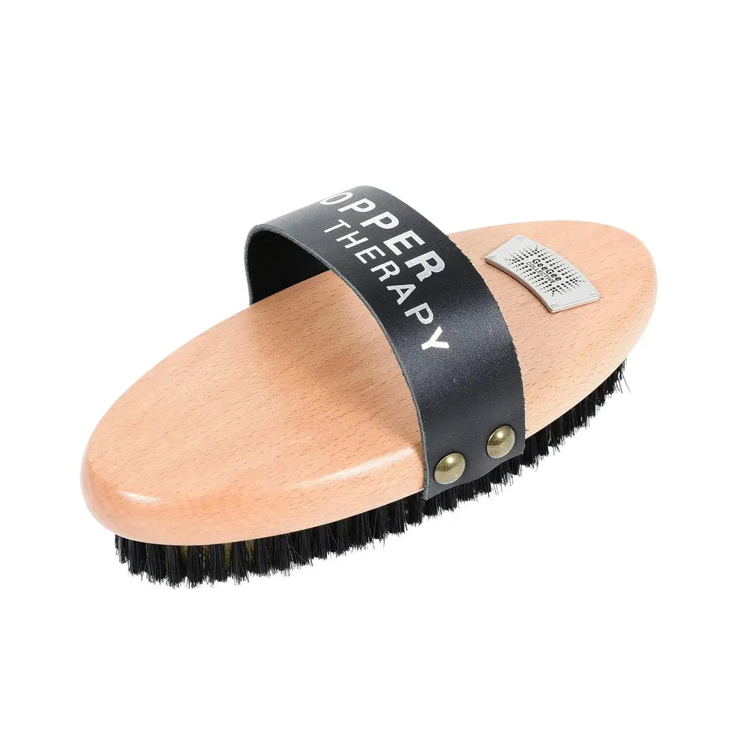 Copper Therapy brush with black bristles and a wooden handle, part of the Ultimate Brush Kit for horse grooming.