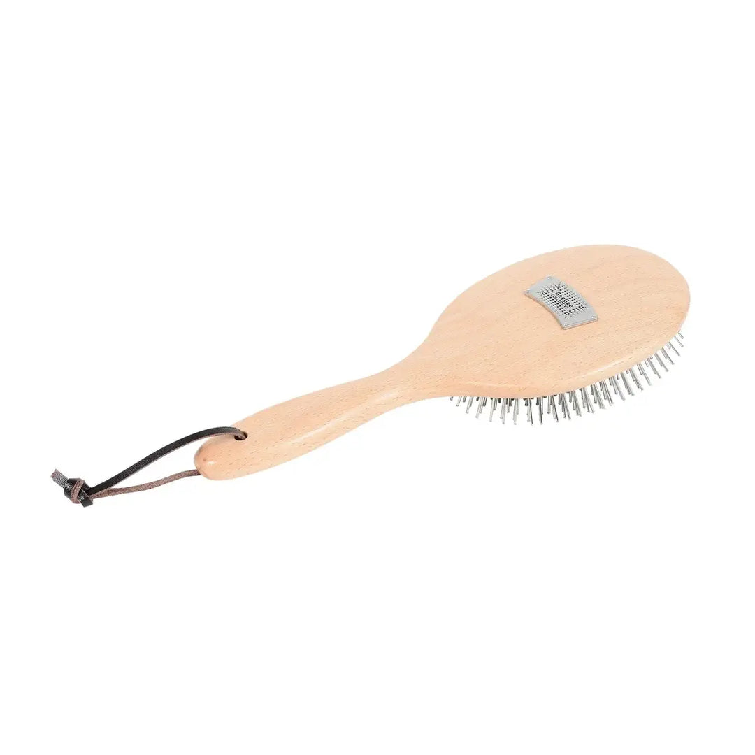 Wooden pin brush with a leather strap, designed for detangling horse manes and tails, included in the Ultimate Brush Kit.