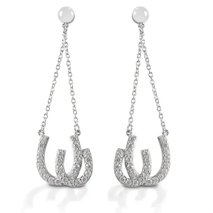 Kelly Herd Double Horseshoe Earrings in sterling silver with cubic zirconia stones. Dangle design with equine-inspired double horseshoe motif.