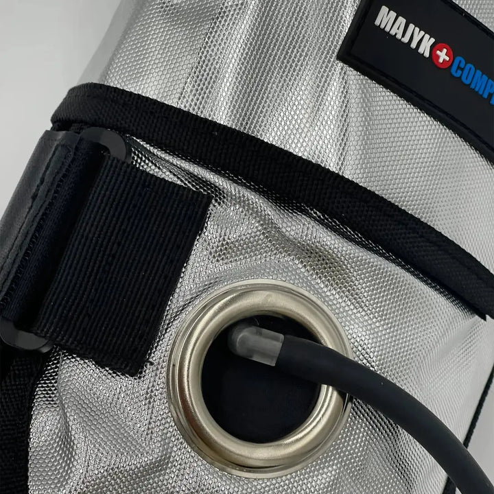 Detailed view of Majyk Equipe Cool Compression Gel Ice Boot's pump connection and durable silver reflective material.