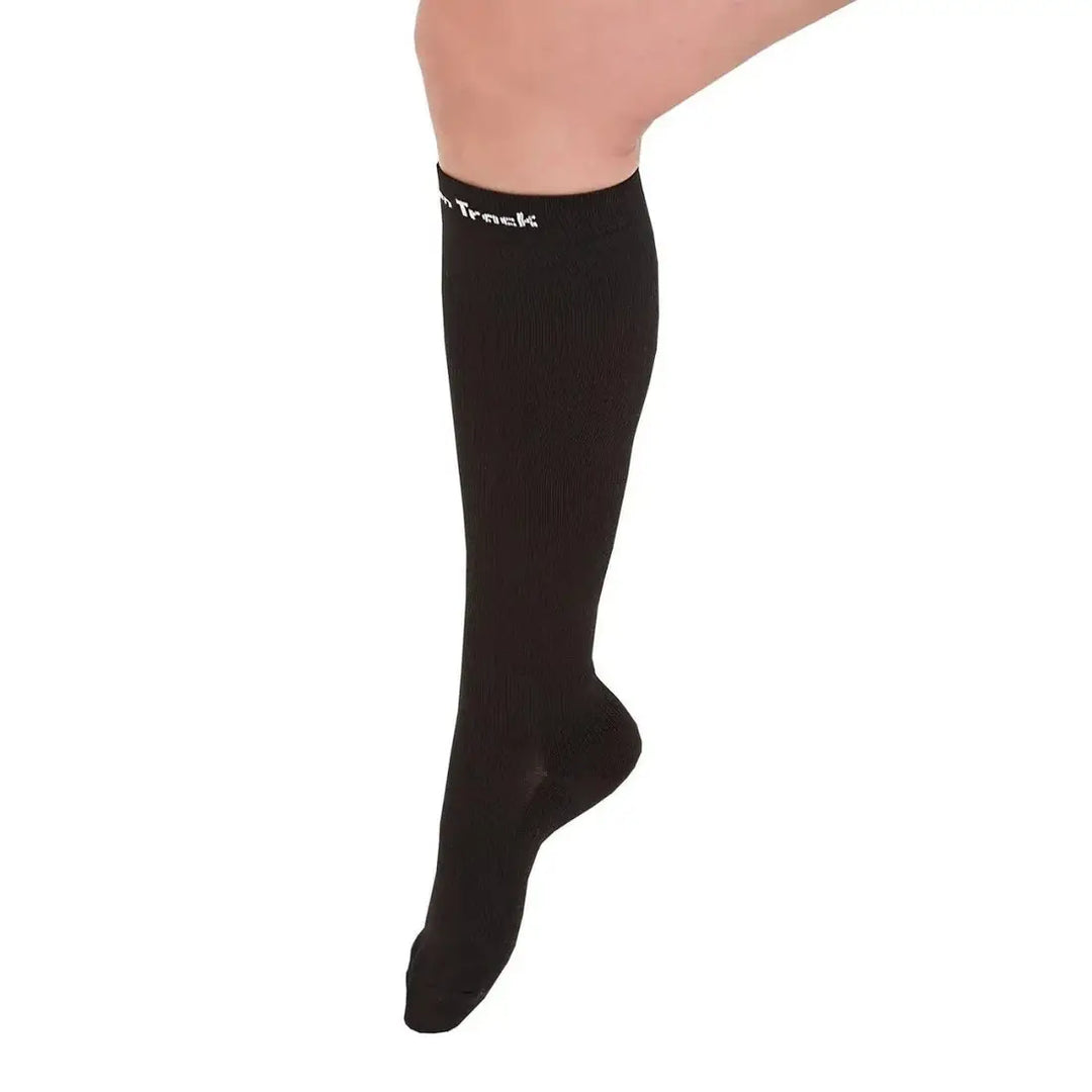 Close-up of Nikki Riding Socks in black, featuring a knee-high design ideal for horse riding and reducing soreness during outdoor use.