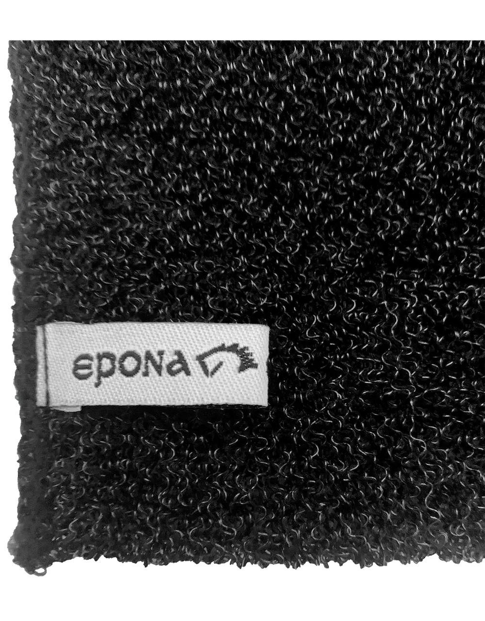 Close-up of the Epona Tiger's Tongue Scrubby Bath Cloth texture with a branded tag, designed for effective horse grooming and cleaning.
