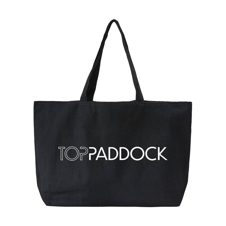 Top Paddock Equestrian Oversized Tote Bag in black with white logo, featuring durable handles and a spacious design for carrying essentials.