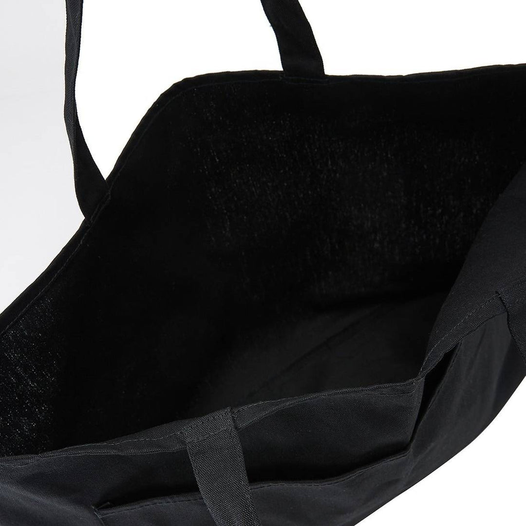 Interior view of the Top Paddock Equestrian Oversized Tote Bag, displaying its spacious black interior for carrying equestrian essentials.