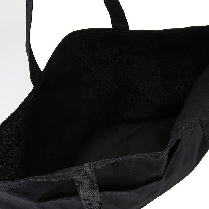 Interior view of the Top Paddock Equestrian Oversized Tote Bag, displaying its spacious black interior for carrying equestrian essentials.