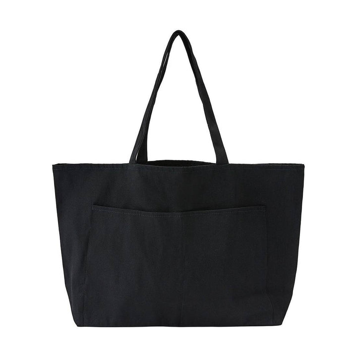 Back view of the Top Paddock Equestrian Oversized Tote Bag in black, highlighting a large exterior pocket for added storage convenience.