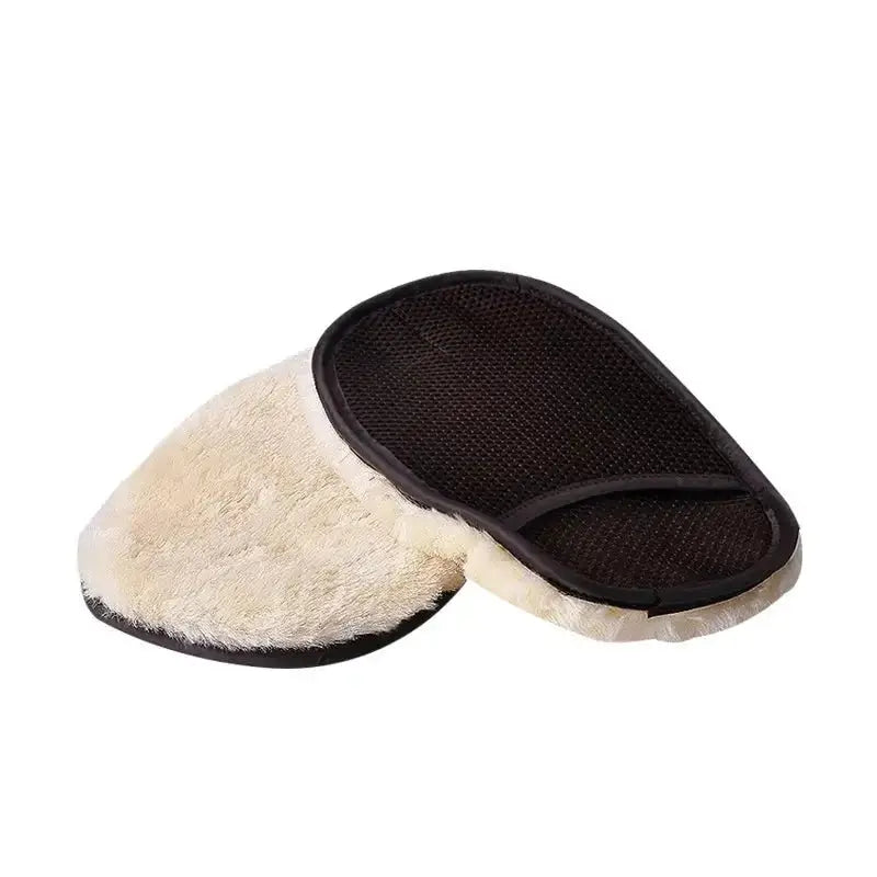 Soft grooming mitt with a plush surface and breathable backing, perfect for gentle horse cleaning and polishing.