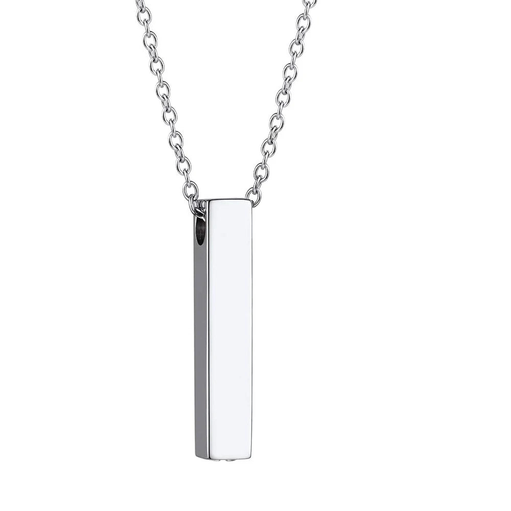Silver engraved pet ashes necklace featuring a sleek vertical bar urn pendant. A timeless keepsake for pet memorial jewelry collections.