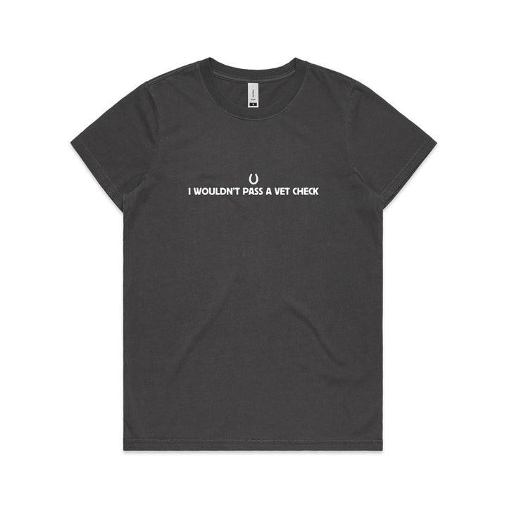 Black t-shirt with white text reading 'I Wouldn't Pass A Vet Check' and a horseshoe graphic, ideal for equestrian enthusiasts.