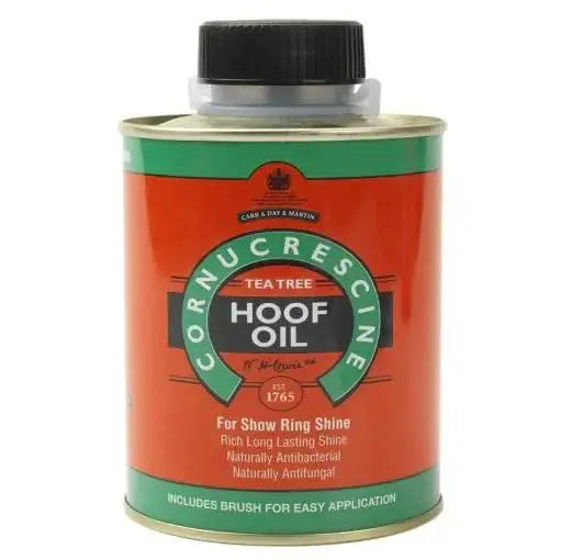 CDM Cornucrescine Tea Tree Hoof Oil in a red and green tin with a built-in brush, designed for horse hoof care and show-ring shine.