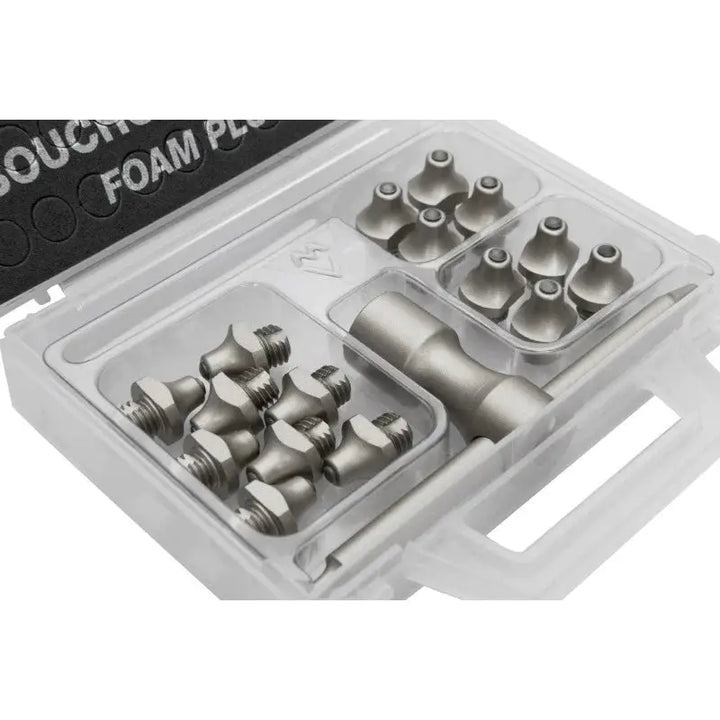 Close-up of FASTUDS Hard Ground Stud Kit components, including studs, foam plugs, and key in an organized plastic case.