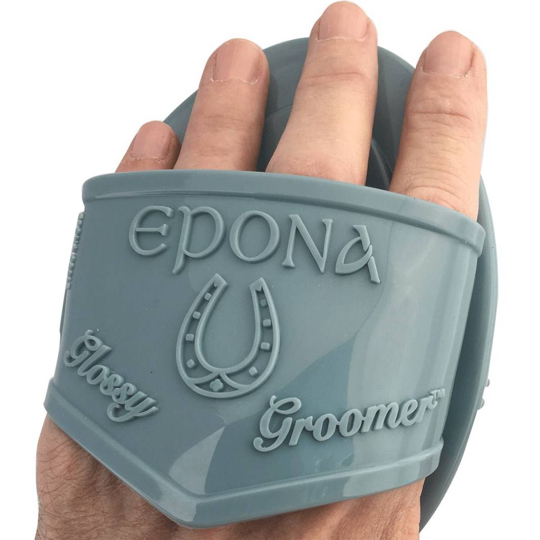 Flexible Glossy Groomer by Epona worn on hand, highlighting its ergonomic grip and ease of use for horse grooming.